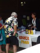 Estee Weinbaum of Oahu-kosher flew over to run the Kosher Booth